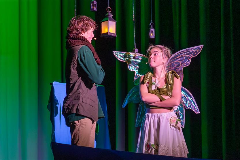 Students perform onstage